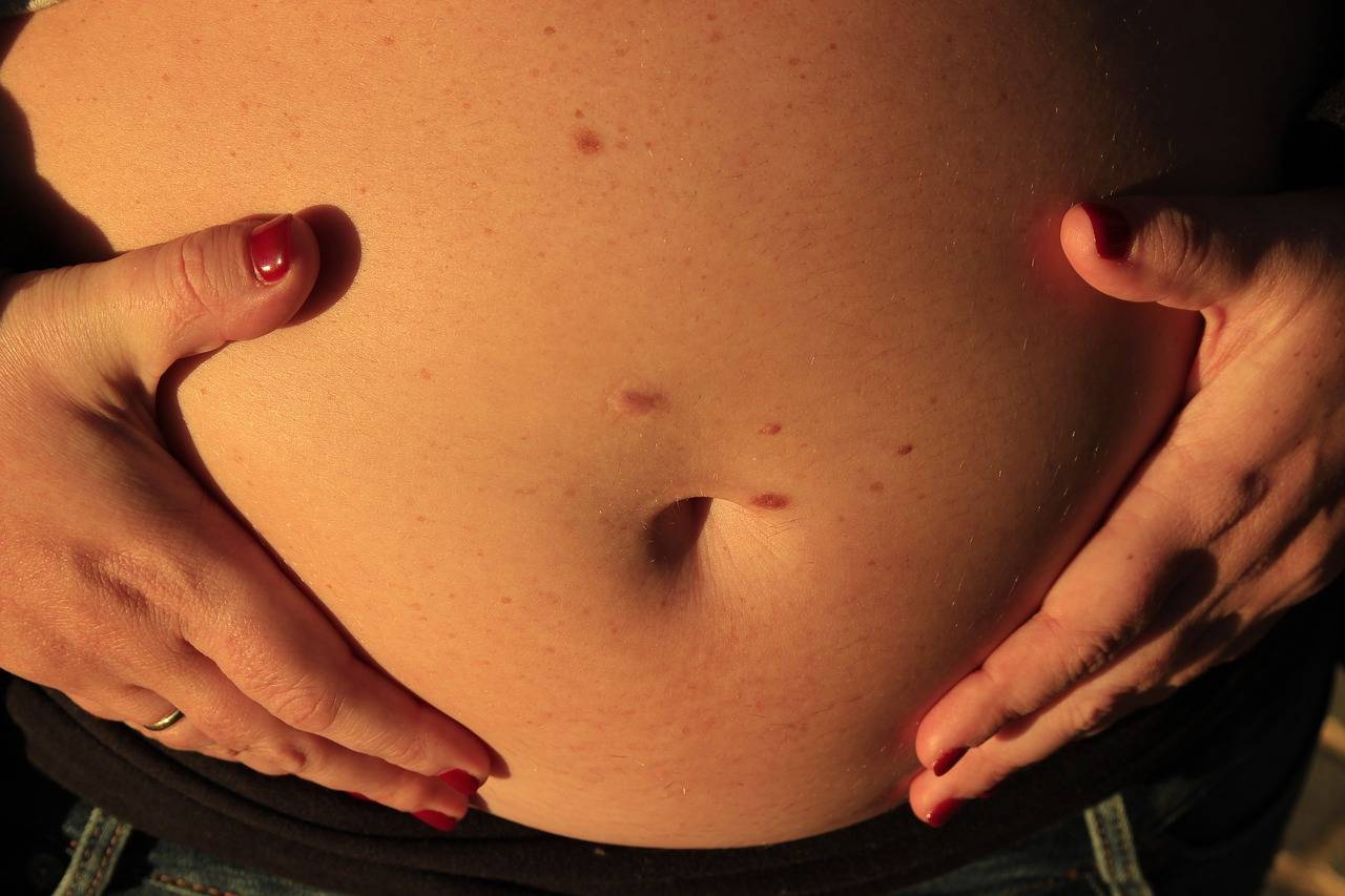 темные пятна на груди во время беременности фото 28